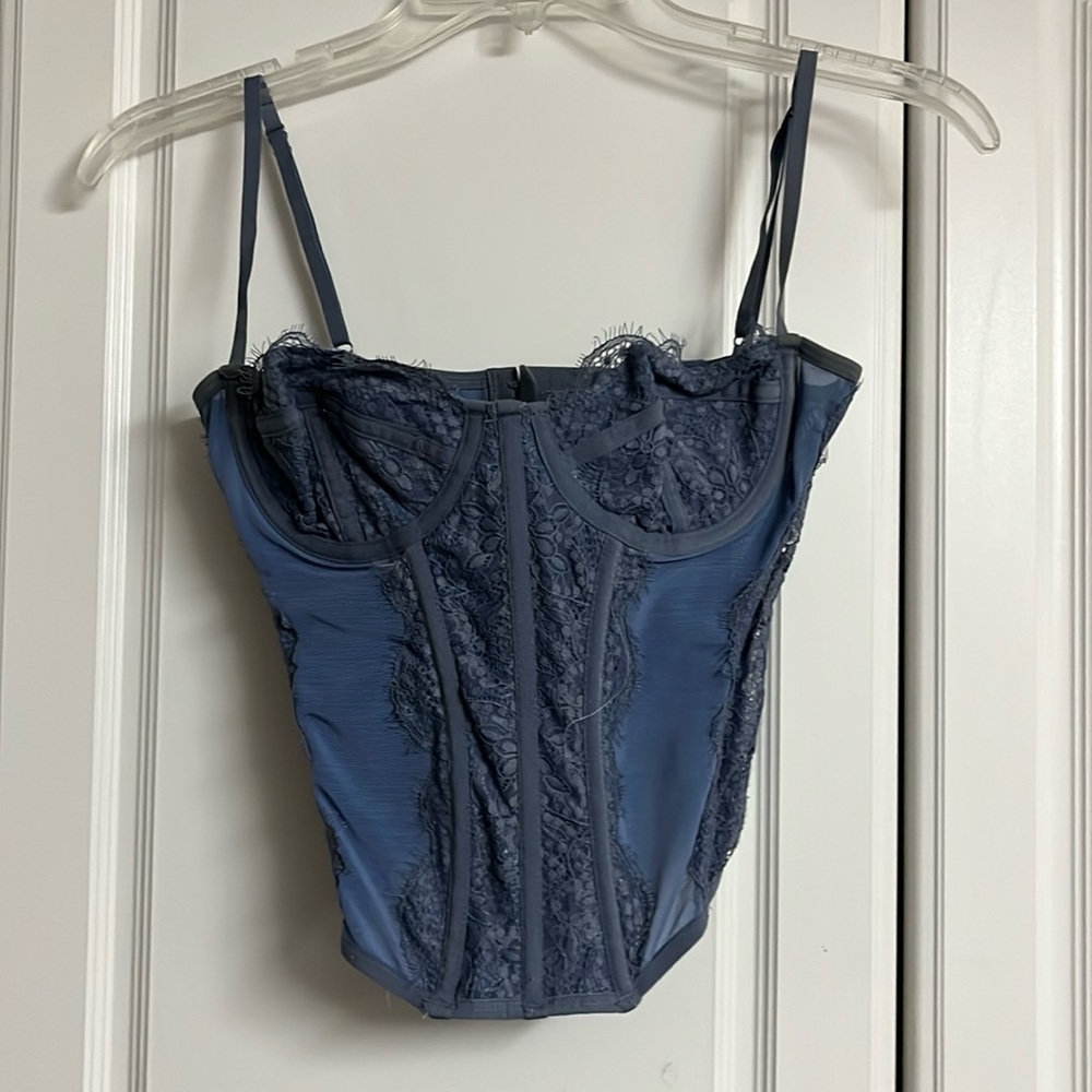 COPY - Out from under for urban outfitters corset.
Size: M
Color: blue